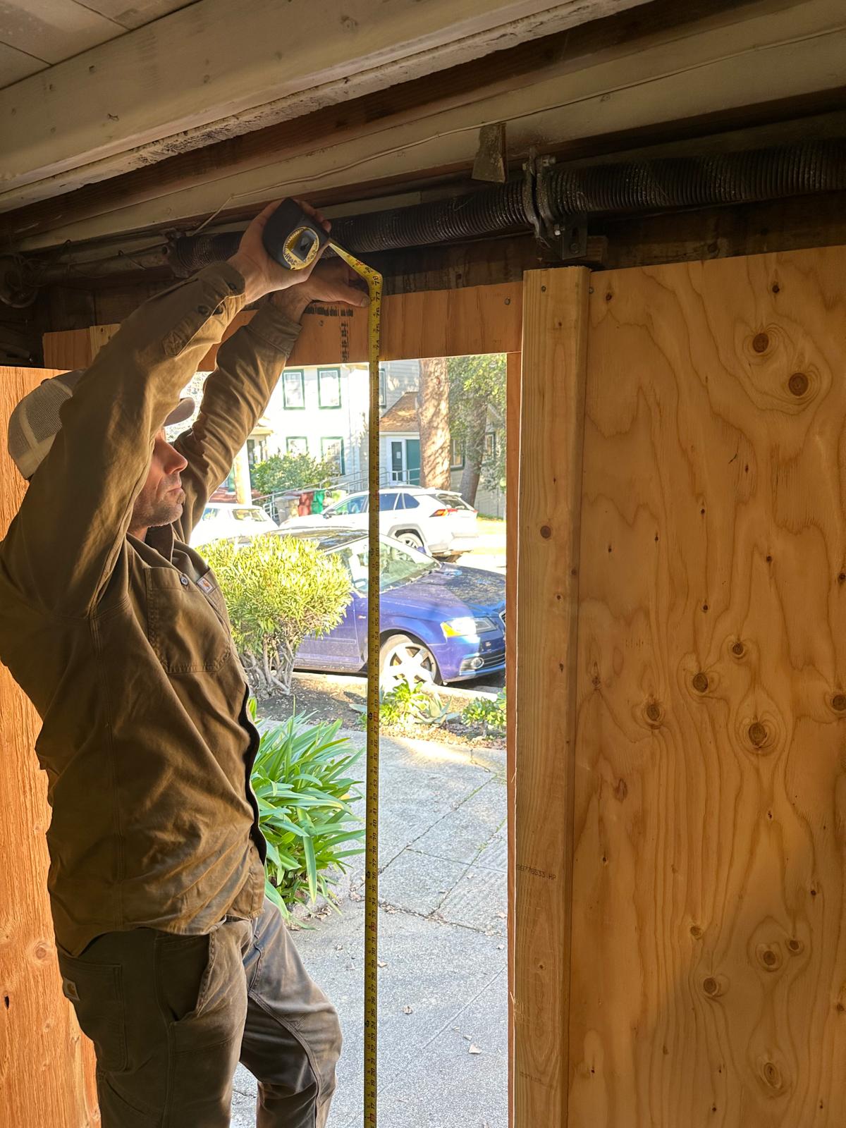 Technician measuring for installation